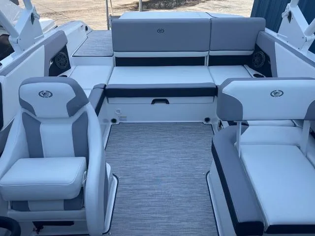 Slide: The Image of 2025 Cobalt CS22 boat interior with gray and white seating, showcasing modern design and comfort. - 15