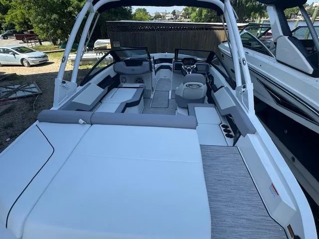 Slide: The Image of 2025 Cobalt CS22 boat interior with spacious seating and modern design. - 25