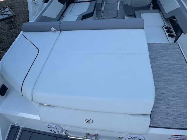 Slide: The Image of 2025 Cobalt CS22 boat interior with cushioned seating and modern design. - 26