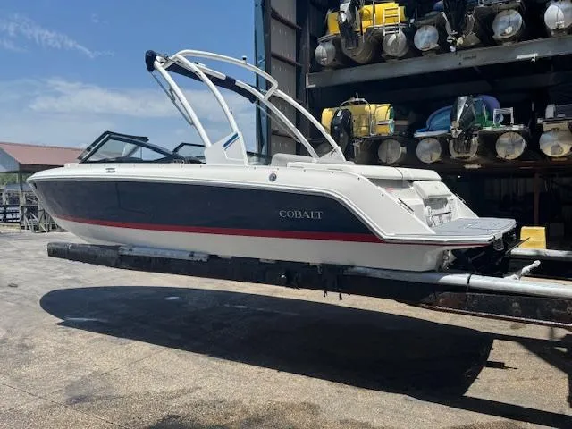 Slide: The Image of 2025 Cobalt CS22 boat in storage, featuring sleek design and modern architecture. - 5