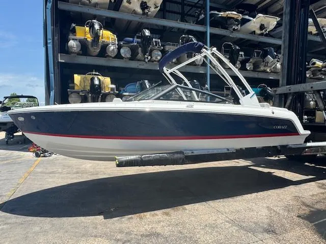 Slide: The Image of 2025 Cobalt CS22 boat in storage, featuring sleek design and modern architecture. - 9