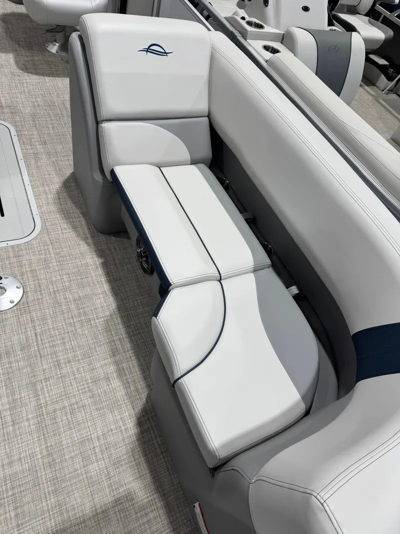 Slide: The Image of 2025 G3 Select 322RC boat interior with sleek, modern seating design. - 5