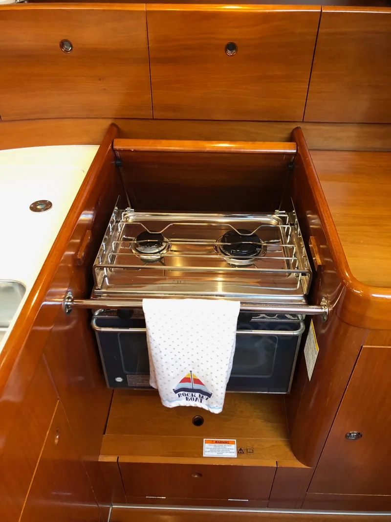 Slide: The Image of Stove Top and Oven - 11