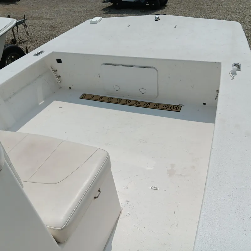 Slide: The Image of 2020 May-Craft 19 Cape Classic boat interior with seating and measuring ruler. - 8