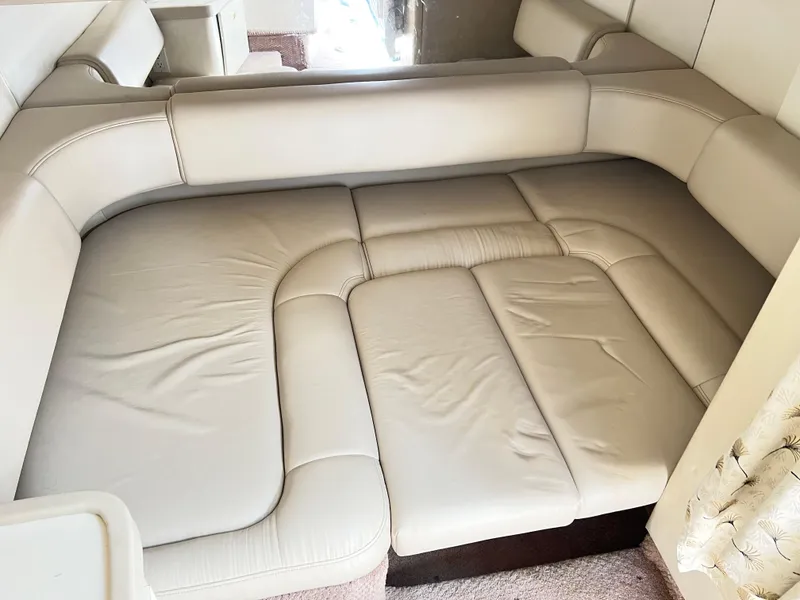 Slide: The Image of 1999 Formula 31 PC interior with beige leather seating arrangement. - 16