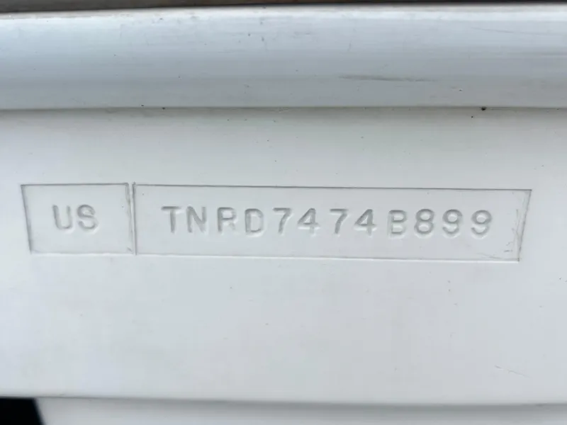 Slide: The Image of Hull identification number on a 1999 Formula 31 PC boat. - 20