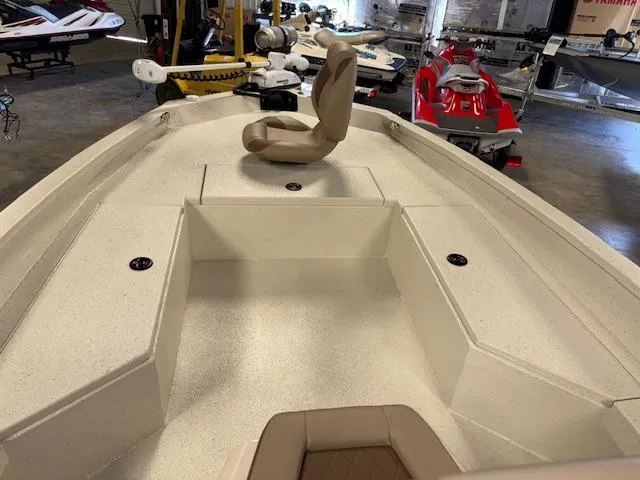 Slide: The Image of 2025 Xpress H22 Bay boat interior with seating, displayed in a showroom. - 20