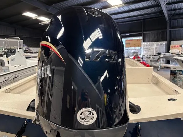 Slide: The Image of 2025 Xpress H22 Bay boat with Yamaha 175 engine in showroom. - 7