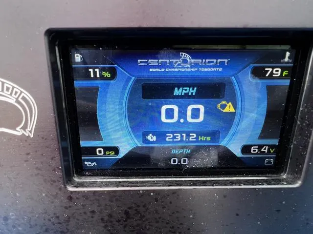 Slide: The Image of Digital dashboard of 2014 Centurion Enzo SS210 boat displaying speed, hours, and temperature. - 9
