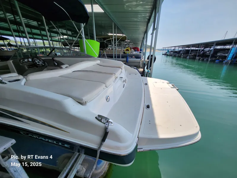 Slide: The Image of 2008 Caravelle 206LS Bow Rider docked in a marina, photographed on May 15, 2025. - 5