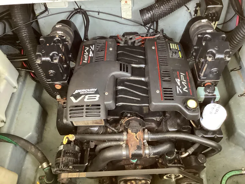 Slide: The Image of Engine compartment of a 2000 Sea Ray 270 Sundancer with a Mercury V8 engine. - 10