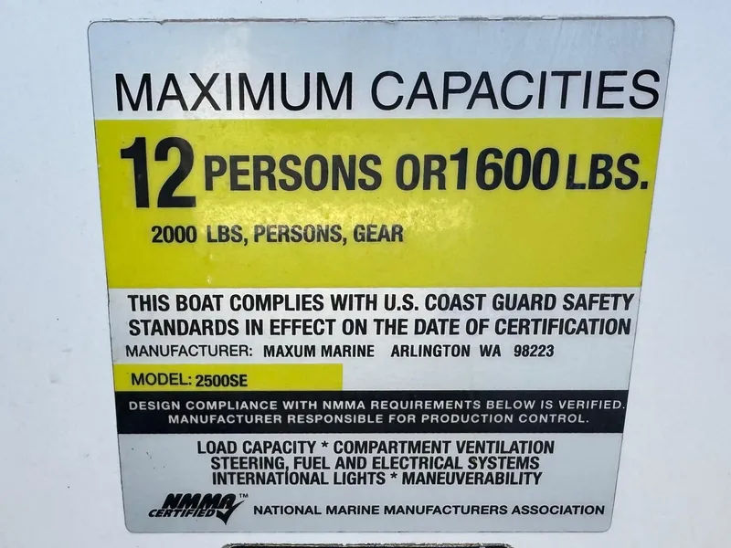 Slide: The Image of Maximum capacity sign for 2004 Maxum 2500 SE boat: 12 persons or 1600 lbs. - 42