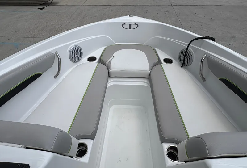 Slide: The Image of Bow seating area of 2019 Tahoe 700 boat with gray and white upholstery. - 14