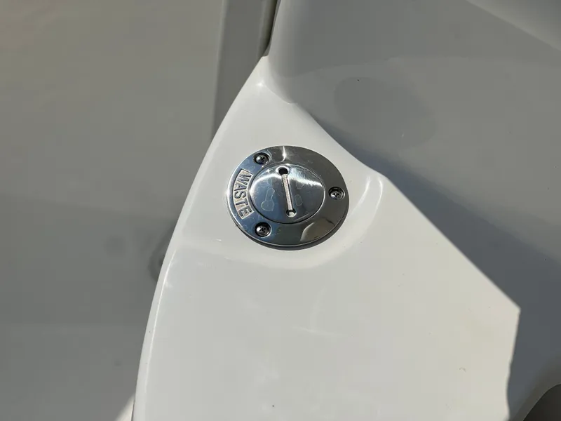 Slide: The Image of Fuel cap on 2025 Key West 239FSR boat, stainless steel finish. - 21