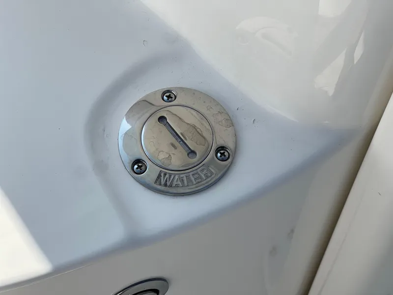 Slide: The Image of Fuel cap on 2025 Key West 239FSR boat, labeled "WATER." - 22