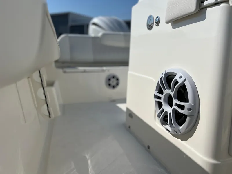 Slide: The Image of 2025 Key West 239FSR boat interior with speaker detail, showcasing modern design and features. - 44