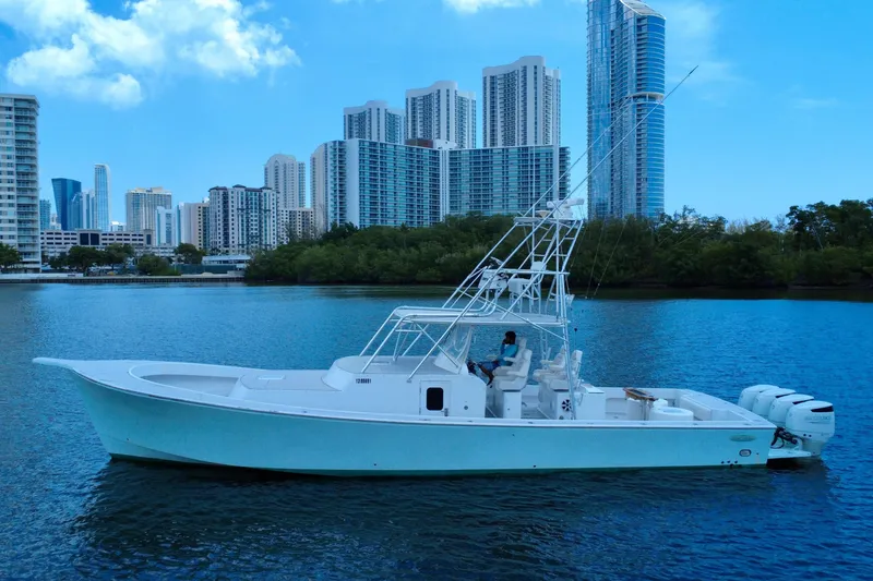 Slide: The Image of 2017 Chesapeake 53 Center Console boat on water with city skyline background. - 10