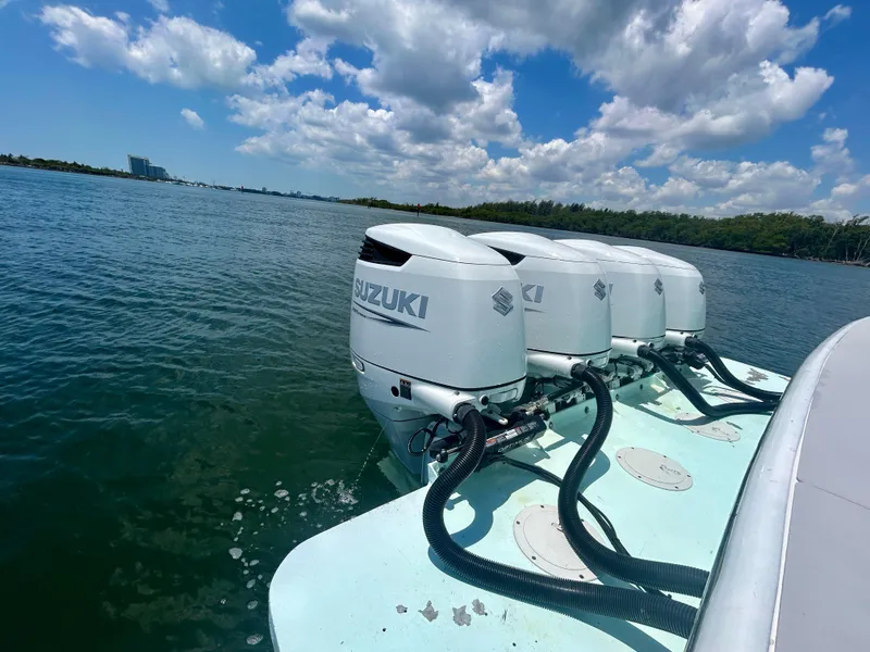 Slide: The Image of Four Suzuki outboard motors on a 2017 Chesapeake 53 Center Console boat. - 17