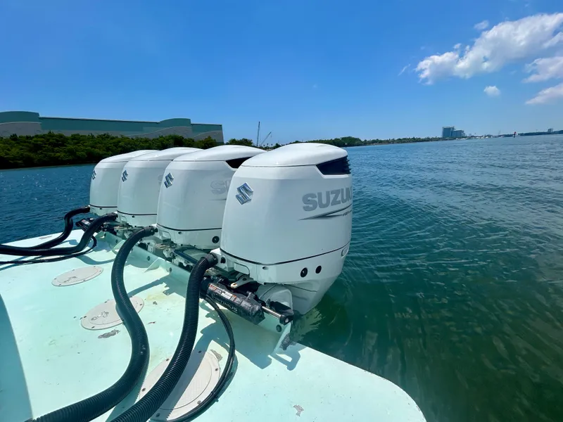 Slide: The Image of Four Suzuki outboard motors on a 2017 Chesapeake 53 Center Console boat. - 19