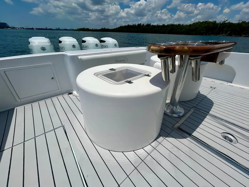 Slide: The Image of 2017 Chesapeake 53 Center Console boat deck with fishing rod holders and ocean view. - 22