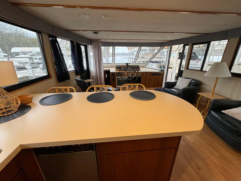 Slide: The Image of Interior of 1996 Skipperliner 560 Coastal Cruiser with modern kitchen and seating area. - 24