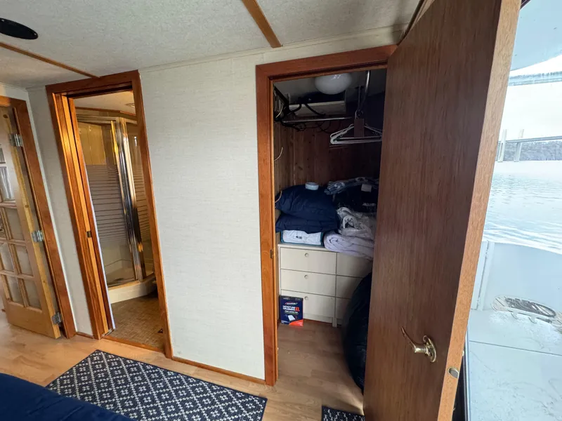 Slide: The Image of Interior of 1996 Skipperliner 560 Coastal Cruiser with closet and bathroom. - 33
