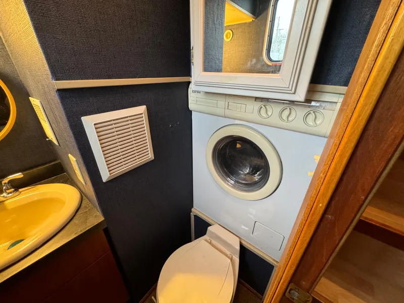 Slide: The Image of Bathroom with washer-dryer in 1996 Skipperliner 560 Coastal Cruiser yacht. - 45