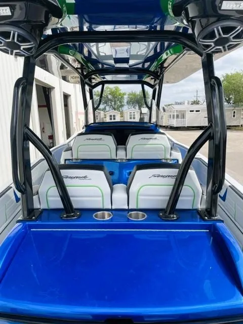 Slide: The Image of 2025 Renegade 38 Open boat with blue deck, modern seating, and sleek design. - 10
