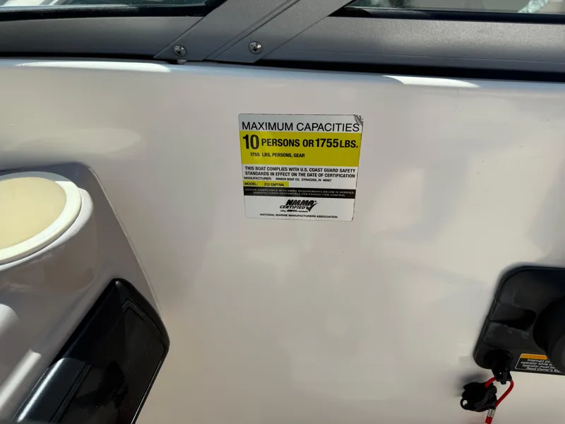 Slide: The Image of 2004 Rinker Captiva boat capacity label, maximum 10 persons or 1755 lbs. - 11