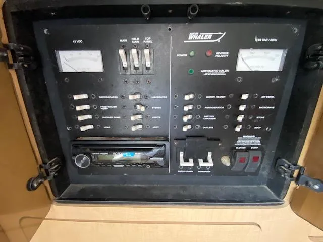 Slide: The Image of Electrical control panel of a 2001 Boston Whaler 28 Conquest boat. - 15