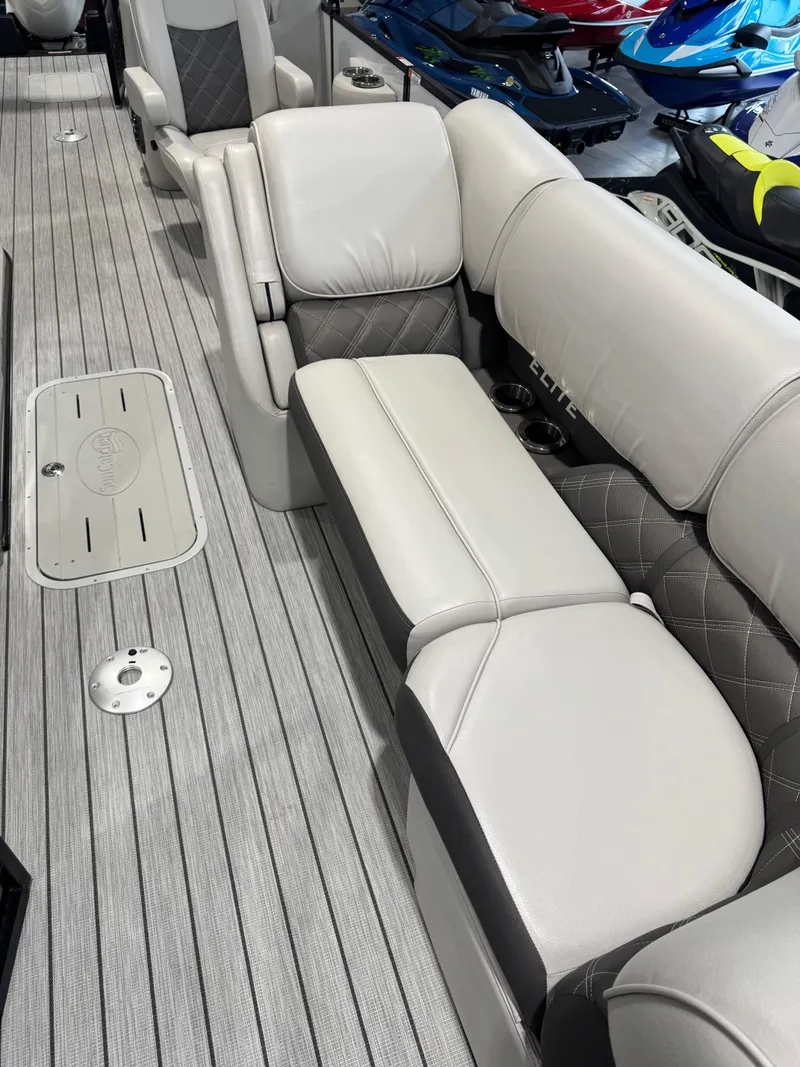Slide: The Image of 2024 G3 Elite 324RC boat interior with luxurious seating and sleek flooring. - 3