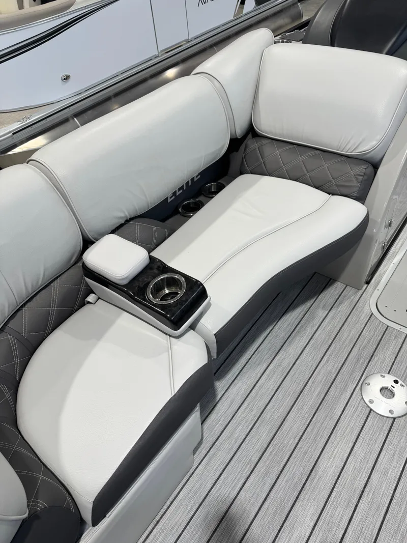 Slide: The Image of 2024 G3 Elite 324RC boat interior with plush seating and cup holders. - 5