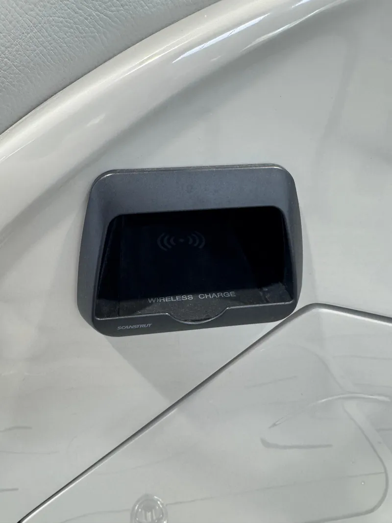 Slide: The Image of 2024 G3 Elite 324RC wireless charging station in sleek interior design. - 6