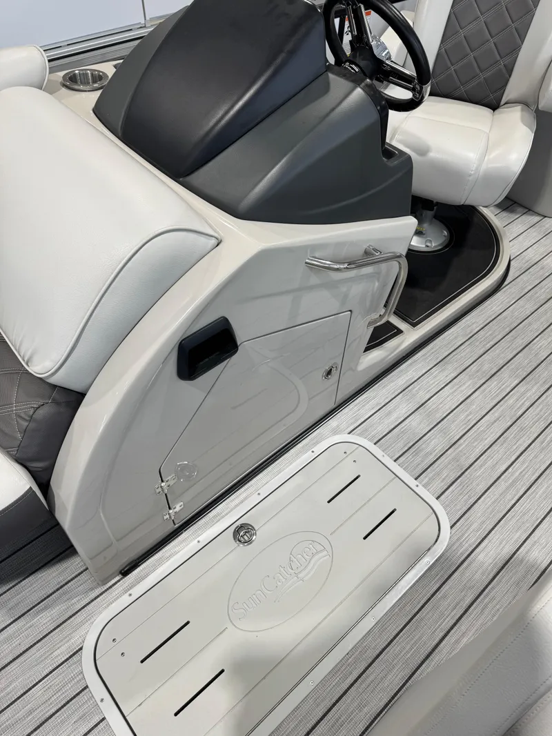 Slide: The Image of 2024 G3 Elite 324RC boat interior with steering console and seating. - 7