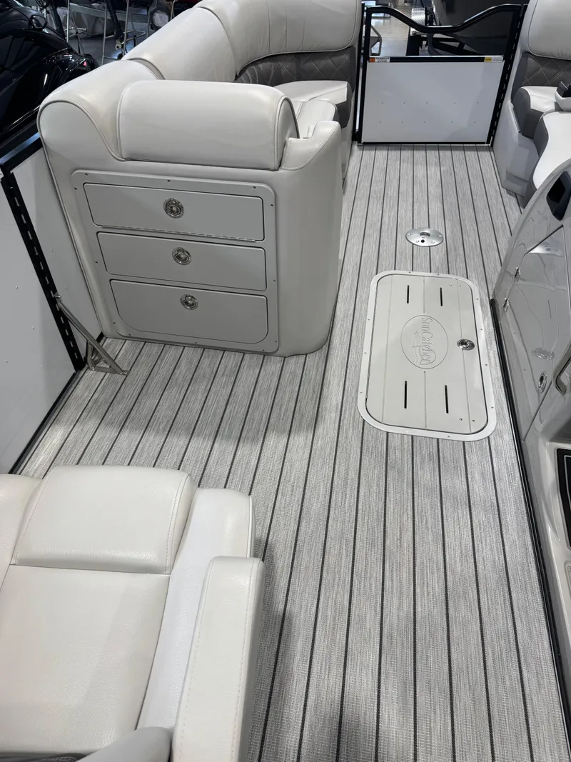 Slide: The Image of 2024 G3 Elite 324RC boat interior with plush seating and sleek flooring. - 9