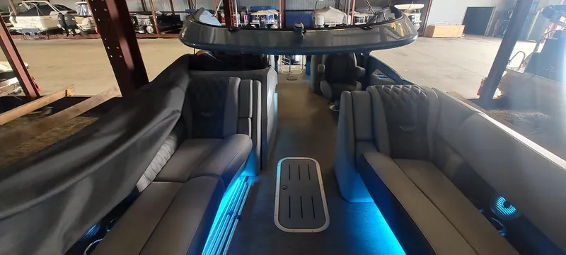 Slide: The Image of 2021 Bennington RX 25 RXFBA pontoon boat interior with blue LED lighting. - 16