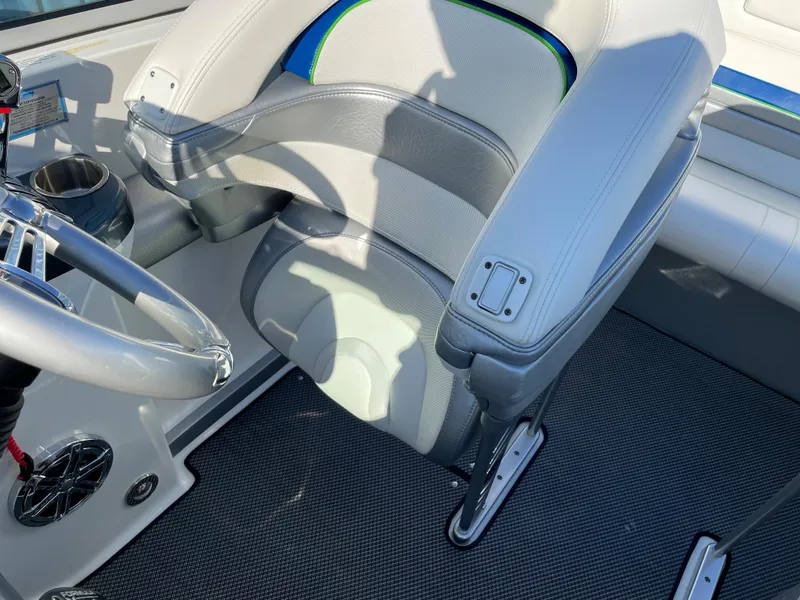 Slide: The Image of 2018 Formula 292 FASTech boat interior with gray seating and steering wheel. - 12