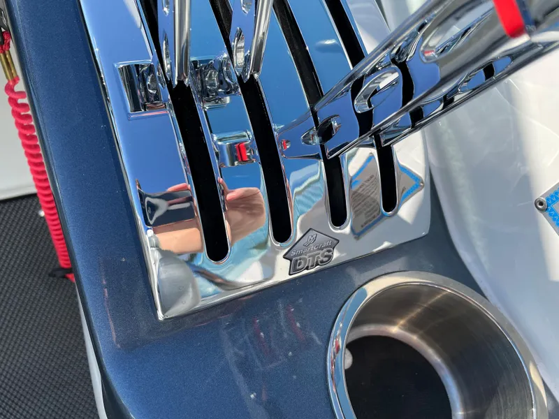 Slide: The Image of Chrome throttle controls on a 2018 Formula 292 FASTech boat dashboard. - 16