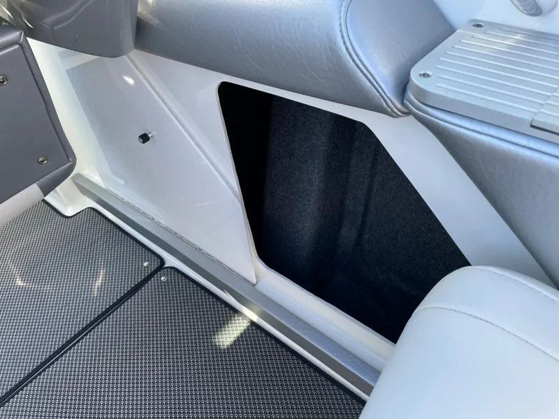 Slide: The Image of Interior view of a 2018 Formula 292 FASTech boat, featuring sleek seating and flooring. - 18