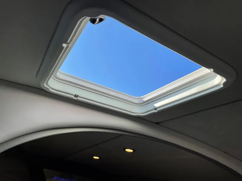 Slide: The Image of Interior view of 2018 Formula 292 FASTech boat with open skylight. - 23