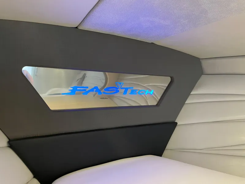 Slide: The Image of 2018 Formula 292 FASTech interior with logo on sleek panel. - 25
