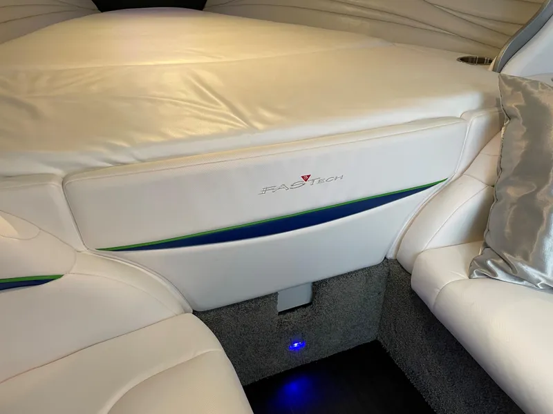 Slide: The Image of 2018 Formula 292 FASTech interior with white leather seating and ambient blue lighting. - 26