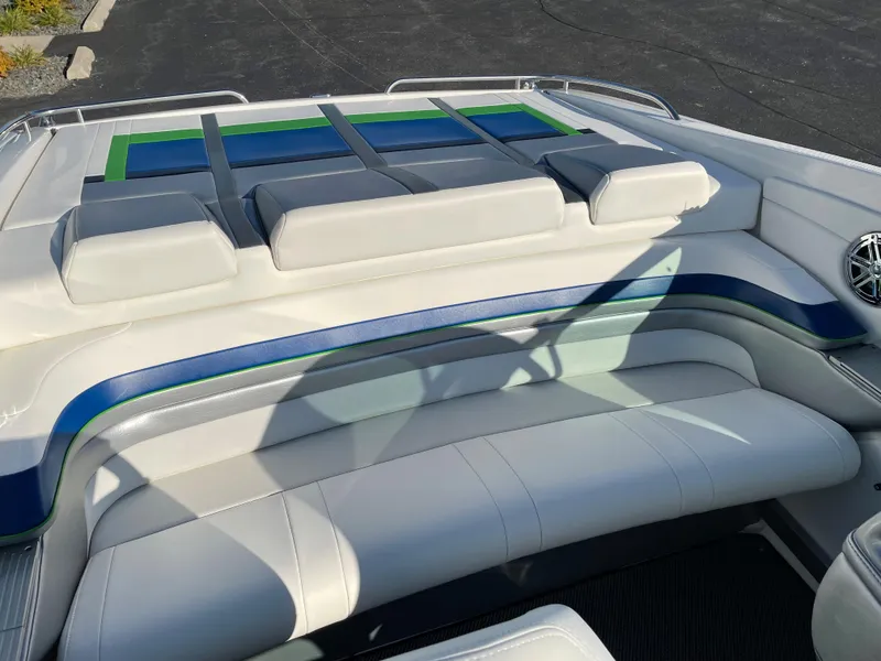Slide: The Image of 2018 Formula 292 FASTech boat interior with white and blue seating. - 31