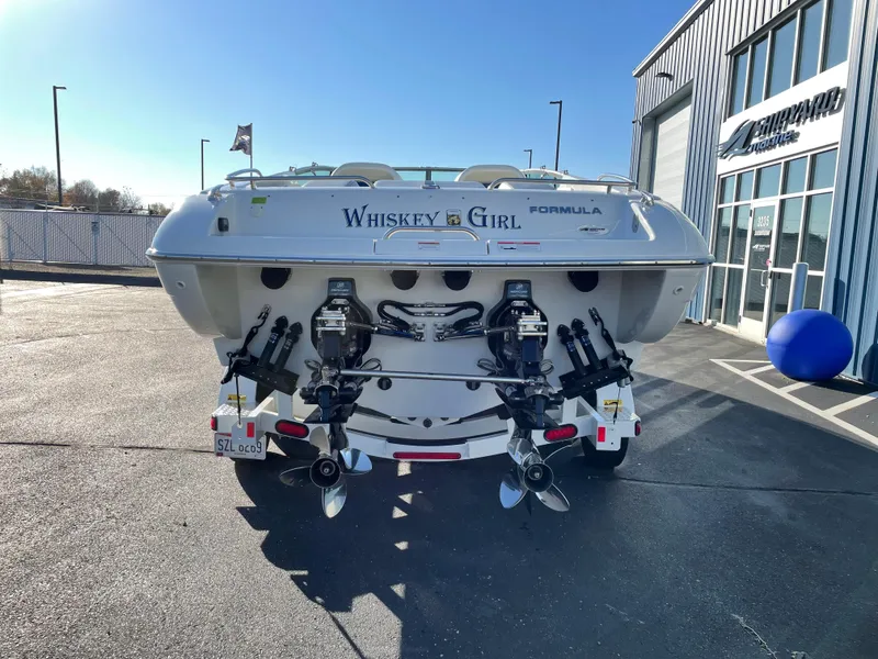 Slide: The Image of 2018 Formula 292 FASTech boat, rear view, parked outside a building. - 4