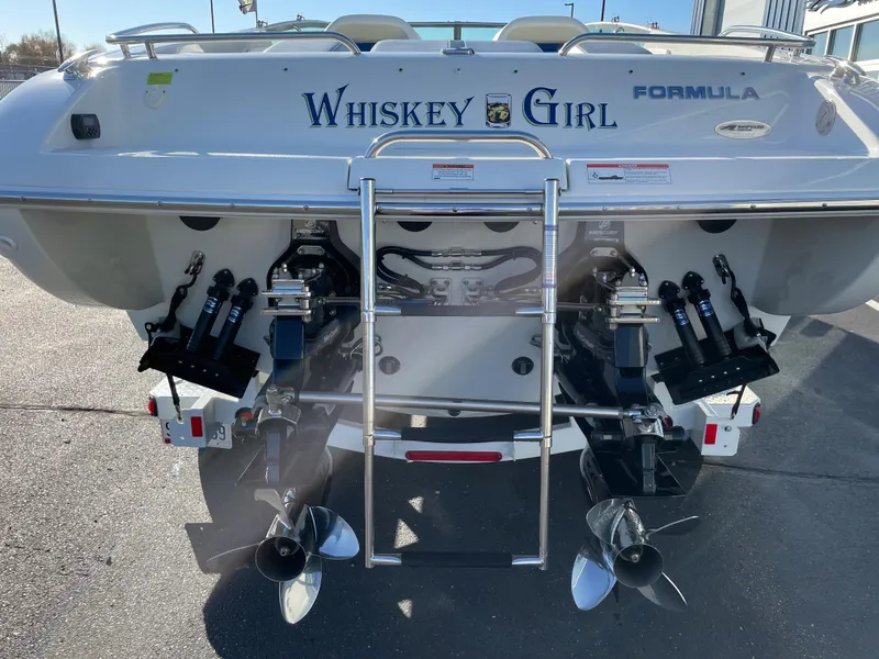 Slide: The Image of 2018 Formula 292 FASTech boat, rear view with dual propellers and "Whiskey Girl" name. - 9