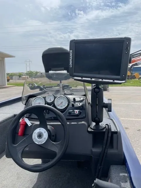 Slide: The Image of 2020 Tracker Pro 170 boat dashboard with steering wheel and mounted Lowrance fish finder. - 3