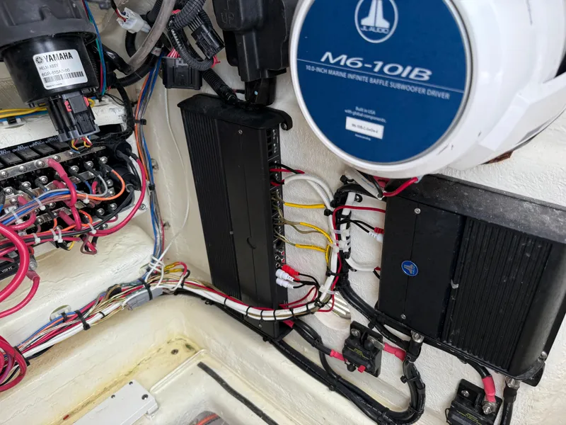 Slide: The Image of Electrical wiring and components inside a 2023 Pathfinder 2500 Hybrid boat. - 21