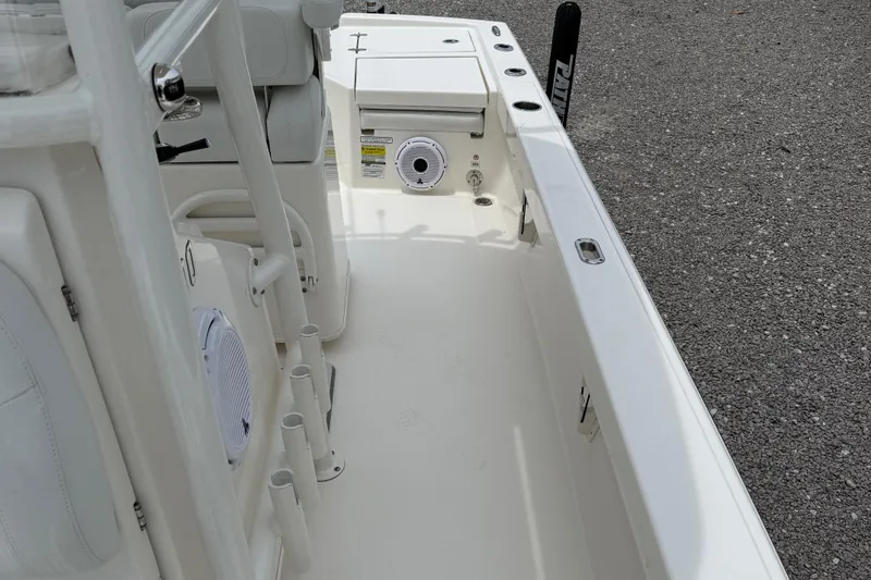 Slide: The Image of 2023 Pathfinder 2500 Hybrid boat interior, featuring seating and storage compartments. - 36