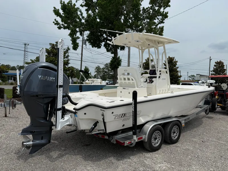 Slide: The Image of 2023 Pathfinder 2500 Hybrid boat on trailer, featuring Yamaha outboard motor. - 5