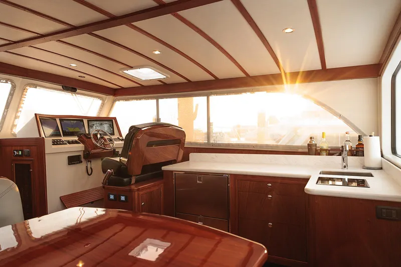 Slide: The Image of Luxurious interior of 2022 Composite Yacht CY46 with sunset view through windows. - 19